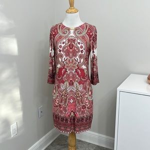 White House black-market pull over sheath dress looks new was too short for me.